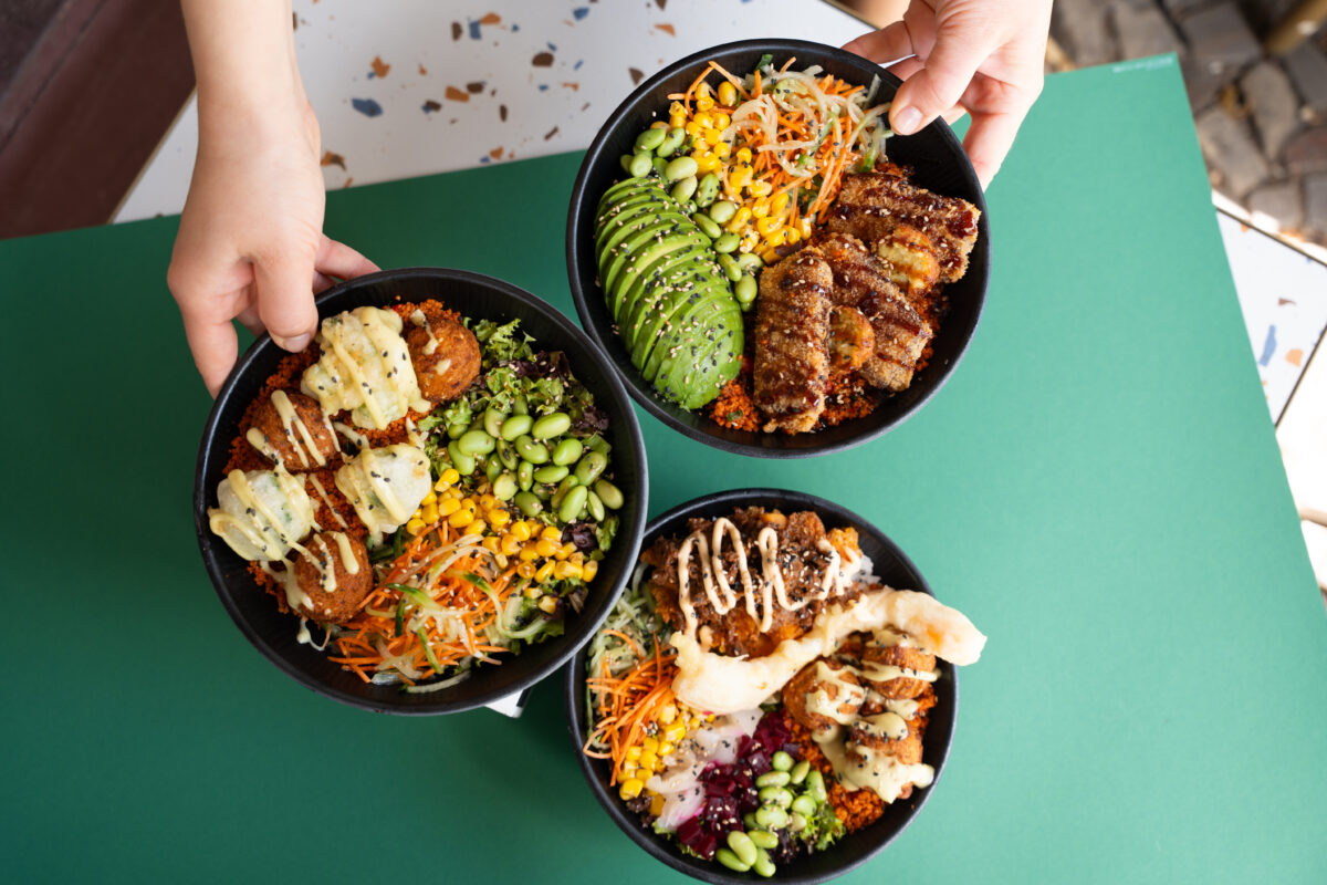 Photo shows three poke bowl meals made with primarily plant-based ingredients