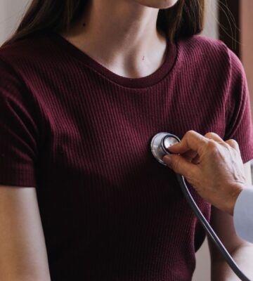 Photo shows a doctor listening to a young woman's heart with a stethoscope. A new study has found that low carb and low fat diets can lower your risk of heart disease, but only if they are rich in nutrient-dense plant-based foods