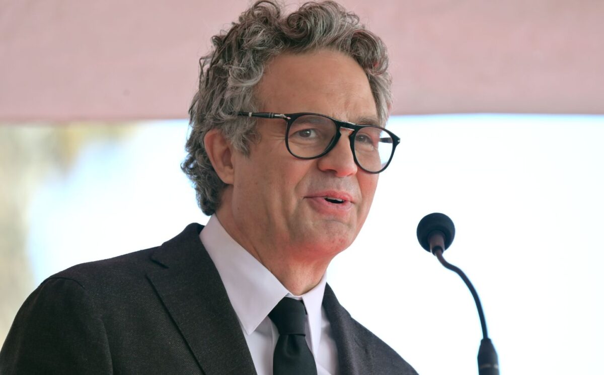 Photo shows actor Mark Ruffalo speaking into a microphone. Mark Ruffalo recently tried a vegan Greggs sausage roll while appearing on JOE’s “The British Test."