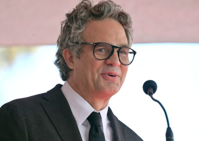 Photo shows actor Mark Ruffalo speaking into a microphone. Mark Ruffalo recently tried a vegan Greggs sausage roll while appearing on JOE’s “The British Test."