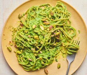 spinach and pistachio spaghetti with silken tofu and nutritional yeast