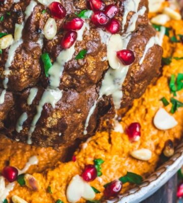 whole roasted cauliflower with harissa and red pepper hummus for roasted red pepper recipes