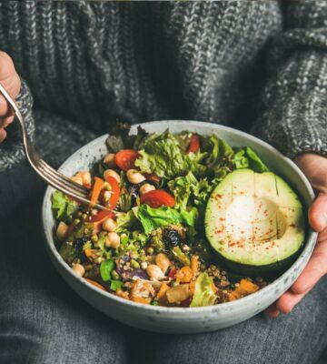 Healthy vegetarian dinner with grains, beans, and vegetables, showing how diverse plant foods support gut health and help achieve 30 plants per week