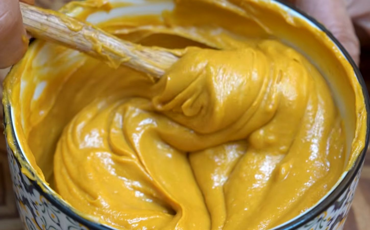 Shot of Miyoko's creamy vegan roadhouse cheddar in a bowl