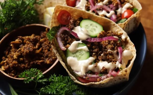 The vegan shawarma recipe comes to life in these pitas filled with shredded crispy tofu, cucumber, tomatoes, sumac onions, and drizzled with tahini sauce