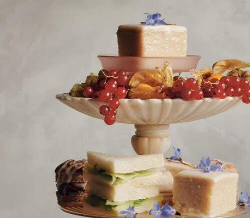 a picture of almond tea cakes made with marzipan, apricot jam, and topped with flowers for your next tea party