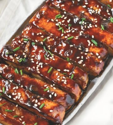 a picture of vegan char siu tofu made with hoisin sauce and five spice for Chinese-inspired dishes
