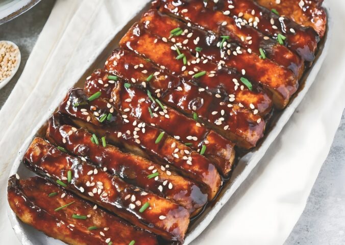 a picture of vegan char siu tofu made with hoisin sauce and five spice for Chinese-inspired dishes