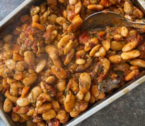 Greek gigantes or giant Greek butter beans with garden veggies and tomato