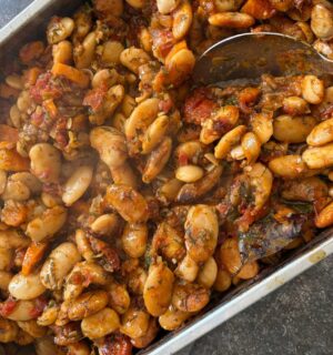 Greek gigantes or giant Greek butter beans with garden veggies and tomato