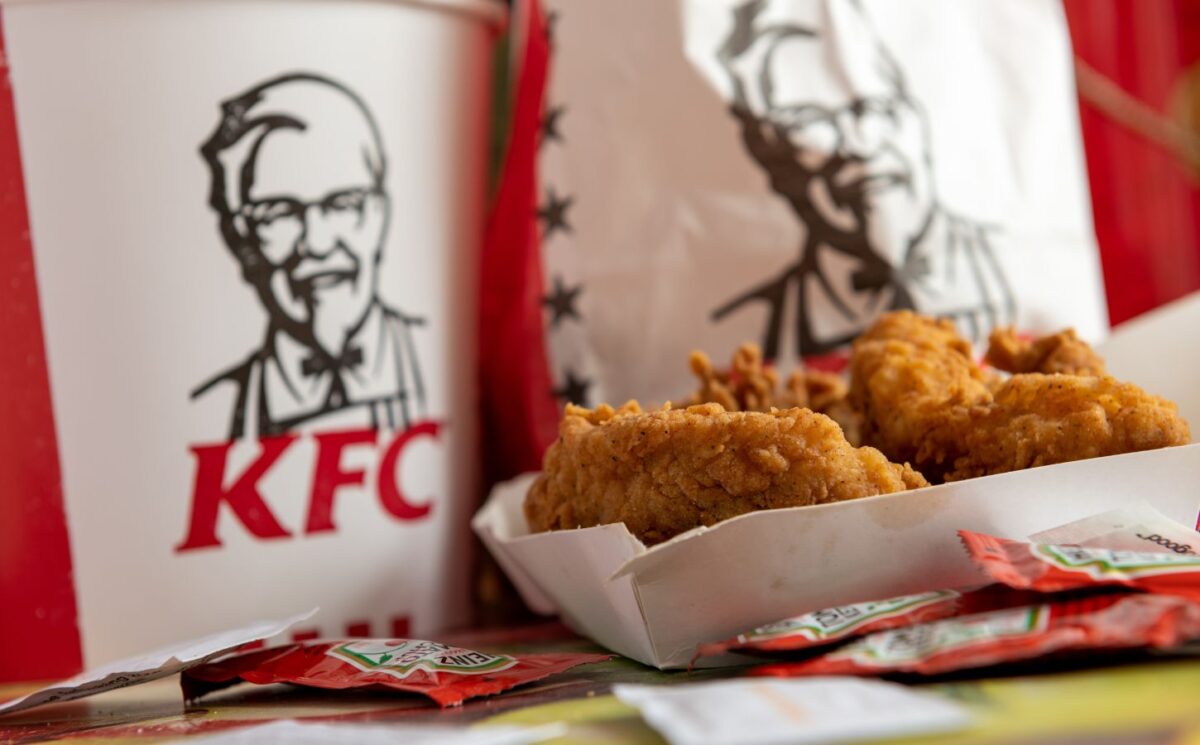 Photo shows a box of KFC chicken in front of KFC branded packaging. Several major fast-food brands have scrapped a key animal welfare pledge to move away from “frankenchickens,” including Nando’s and KFC.