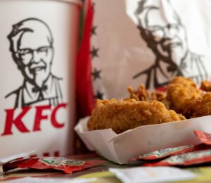 Photo shows a box of KFC chicken in front of KFC branded packaging. Several major fast-food brands have scrapped a key animal welfare pledge to move away from “frankenchickens,” including Nando’s and KFC.