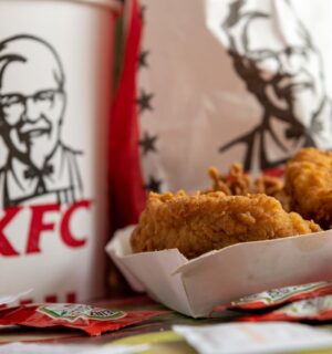 Photo shows a box of KFC chicken in front of KFC branded packaging. Several major fast-food brands have scrapped a key animal welfare pledge to move away from “frankenchickens,” including Nando’s and KFC.