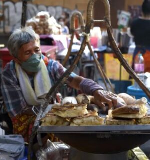 Photo shows a screengrab of a woman preparing street food taken from the docuseries 'Thai Street Food: Best Kept Secrets,' which has become one of the most-watched shows on HBO Max Asia within days of its release