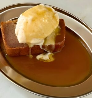 sticky toffee butter mochi with ice cream and caramel sauce