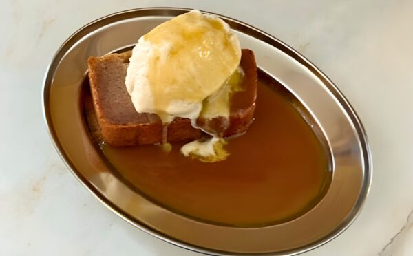 sticky toffee butter mochi with ice cream and caramel sauce