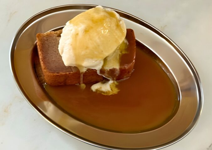 sticky toffee butter mochi with ice cream and caramel sauce