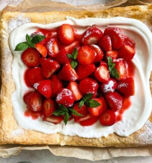 a vegan strawberry galette with dairy-free whipped cream