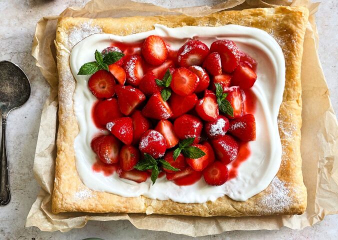 a vegan strawberry galette with dairy-free whipped cream