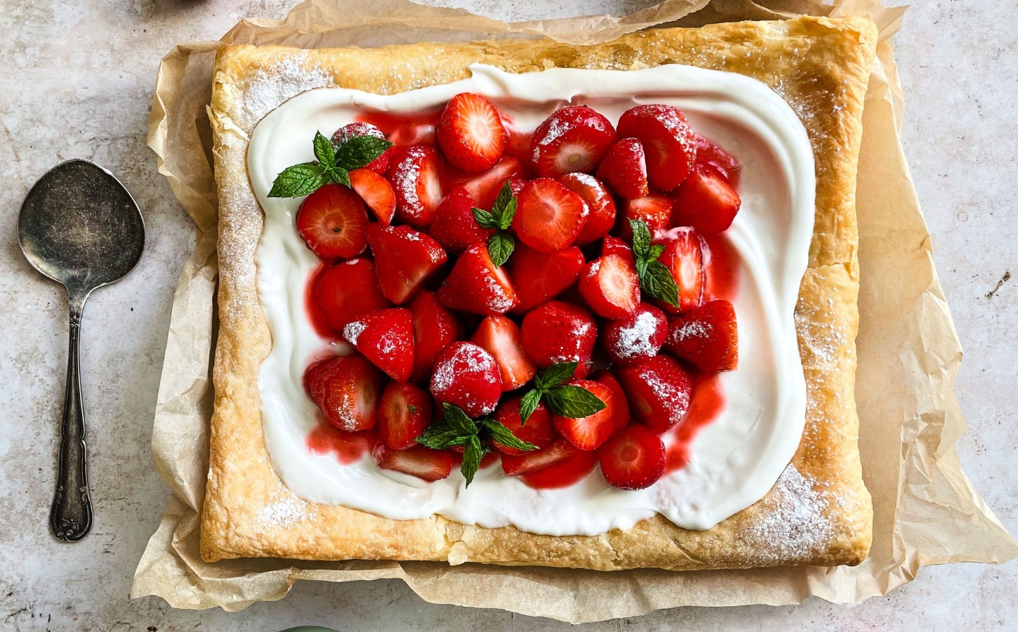 a vegan strawberry galette with dairy-free whipped cream