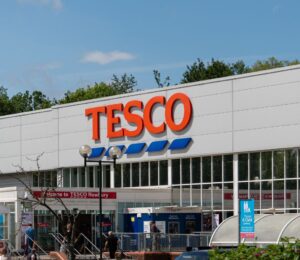 Photo shows the front of a large Tesco supermarket in Newbury, UK. Tesco just reported plant-based food growth “for the first time in years" based on Nielsen data and its own product sales