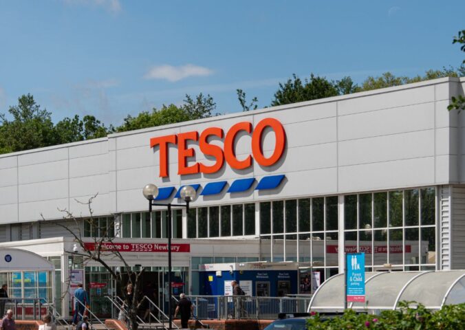 Photo shows the front of a large Tesco supermarket in Newbury, UK. Tesco just reported plant-based food growth “for the first time in years" based on Nielsen data and its own product sales