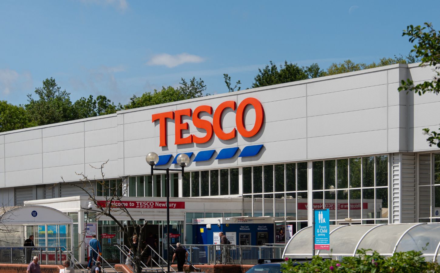 Photo shows the front of a large Tesco supermarket in Newbury, UK. Tesco just reported plant-based food growth “for the first time in years" based on Nielsen data and its own product sales