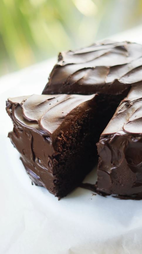 The Ultimate Vegan Chocolate Cake with dark chocolate ganache, cocoa, and coffee