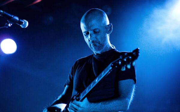 Photo shows Moby performing onstage. Vegan Camp Out has announced that Moby will speak at this year’s festival.