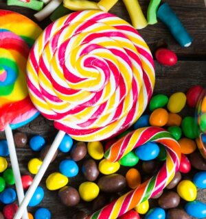 A shot of assorted colorful candy that may contain artificial dyes and additives linked to fossil fuels