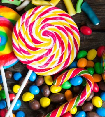 A shot of assorted colorful candy that may contain artificial dyes and additives linked to fossil fuels