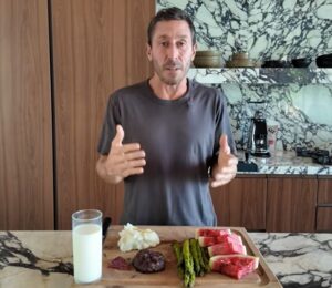 Photo shows Paul Saladino, AKA the "Carnivore MD," while speaking about what he eats in a day. Paul Saladino has now expanded his carnivore diet to include several fruits and vegetables