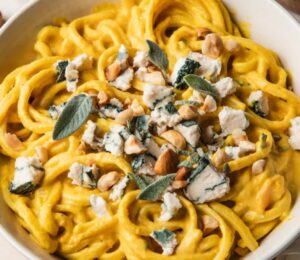 Creamy Squash And Blue Cheese Pasta with vegan blue cheese alternative and hazelnuts