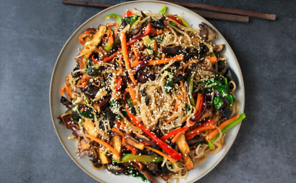 Vegan Japchae (Stir-Fried Glass Noodles) with smoked tofu and veggies