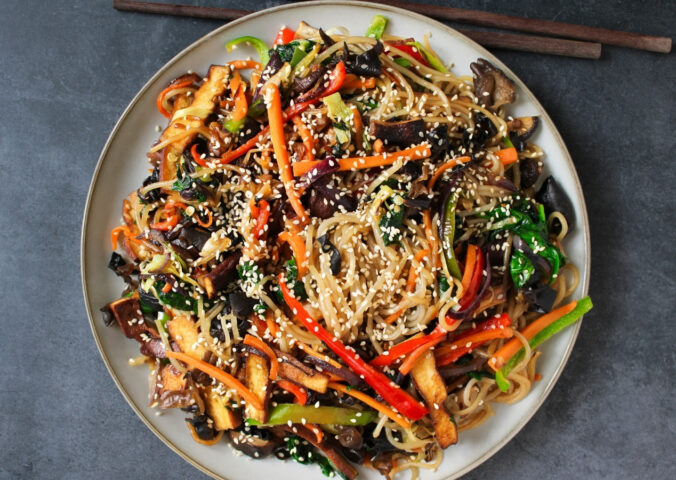 Vegan Japchae (Stir-Fried Glass Noodles) with smoked tofu and veggies