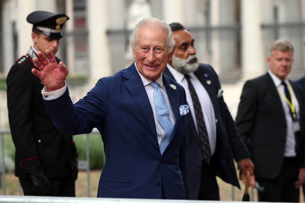 Photo shows King Charles III, a member of the British royal family, waving during an engagement in Rome, Italy. The royal family recently served a meat-free state banquet while hosting the president and first lady of Nigeria.