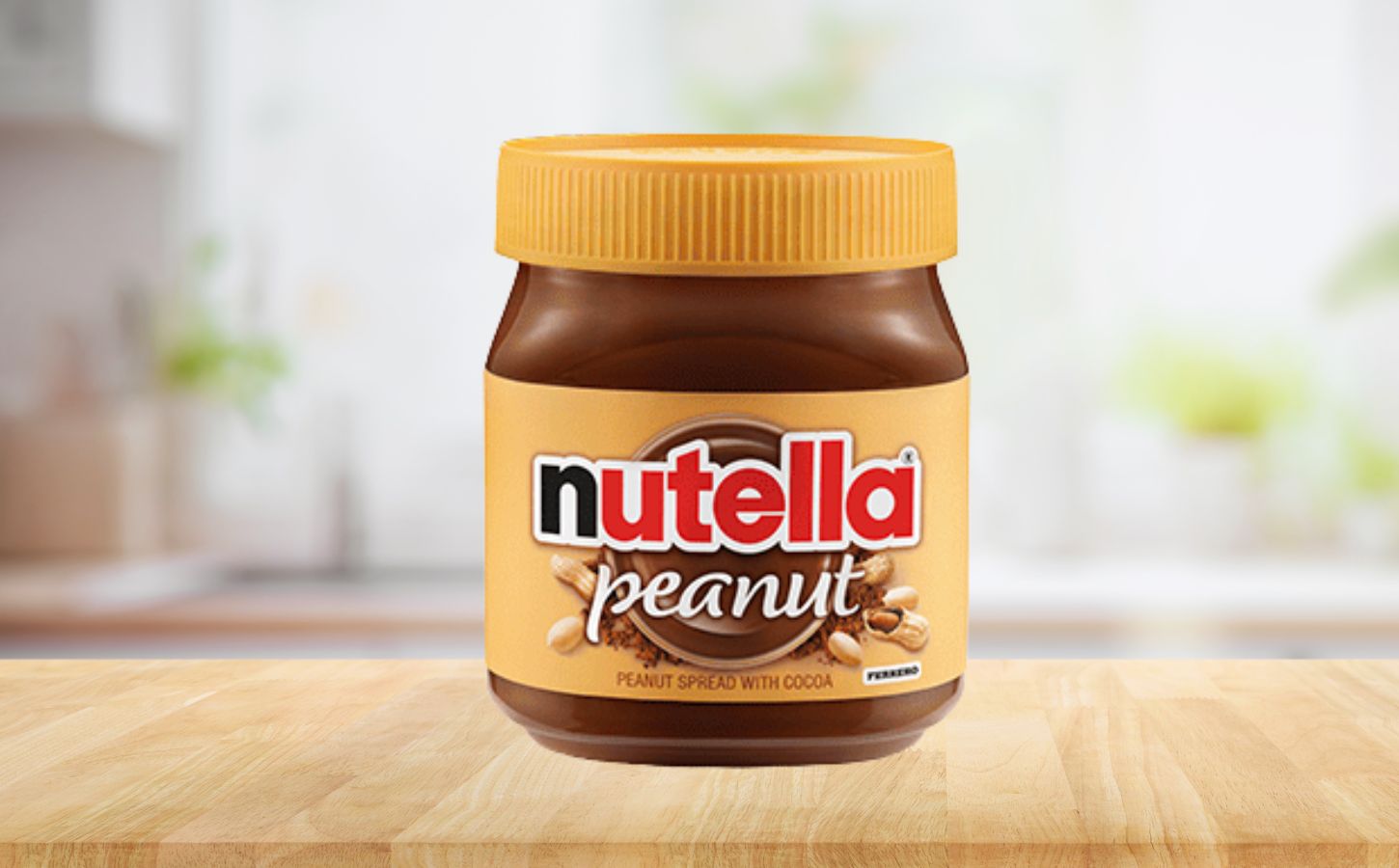 Photo shows a jar of the new Nutella Peanut on a stock kitchen background. To celebrate World Nutella Day, Ferrero finally launched Nutella Peanut, which is both the first vegan Nutella product in North America and an entirely new flavor for the brand