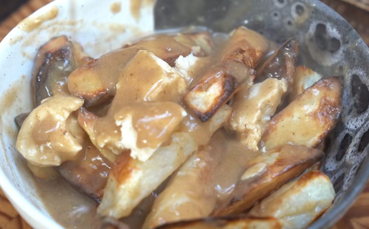 Schinner's vegan poutine recipe yielded this bowl of French fries topped with tofu cheese curds and mushroom gravy