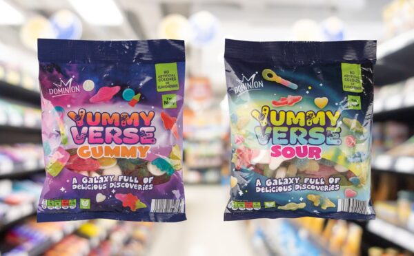 Photo shows the two new flavors of Yummy Verse Gummy sweets - classic (left) and sour (right) - against a blurry supermarket background. Aldi's new Haribo Starmix-style sweets are vegan