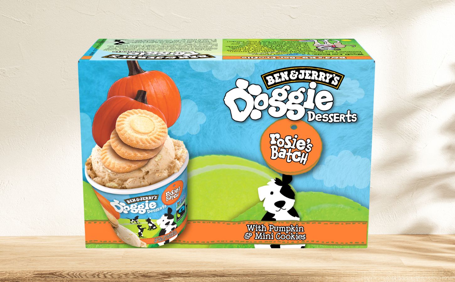 Photo shows a box of the Ben & Jerry’s Doggy Desserts in "Rosie’s Batch" flavor, featuring pumpkin and mini cookies, against a stock background. It’s nearly summer, and people are once again eating Ben & Jerry’s Doggy Desserts. But this time, the pup-friendly ice creams appear to be “accidentally” vegan