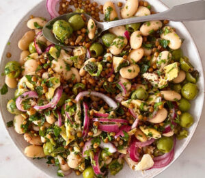herby olive butter bean and lentil salad with pickled onion and za'atar