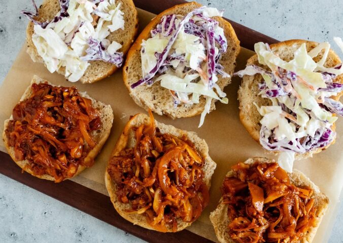 smoky BBQ shredded jackfruit on sliders with coleslaw for plant-based BBQ recipes