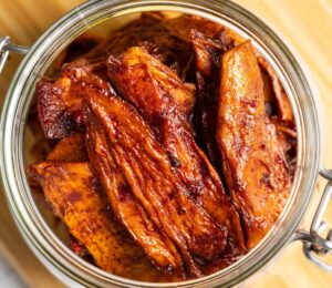 Smoky Chipotle Mango Jerky with gluten-free tamari, maple syrup, garlic, lime, chipotle