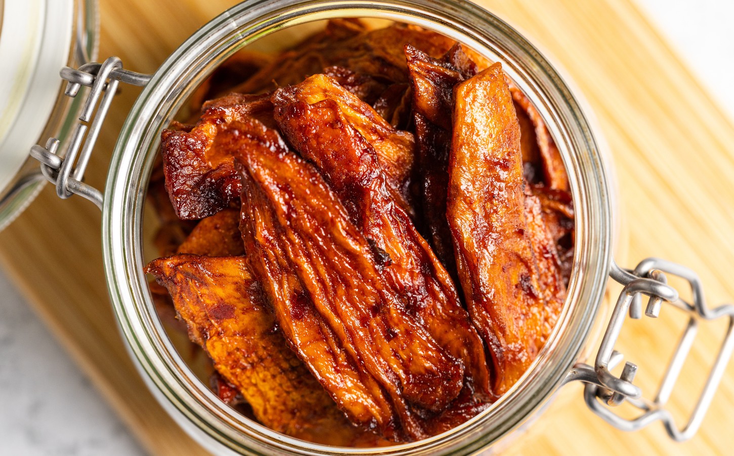Smoky Chipotle Mango Jerky with gluten-free tamari, maple syrup, garlic, lime, chipotle
