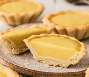 Vegan Chinese Egg Tarts with vegan crust, maple syrup glaze, vegan custard powder and kala namak