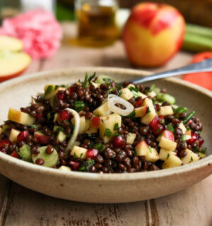 vegan apple summer salad with pomegranate, lentils, and mint