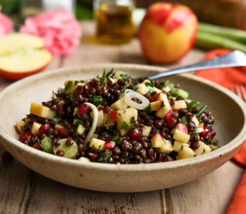 vegan apple summer salad with pomegranate, lentils, and mint