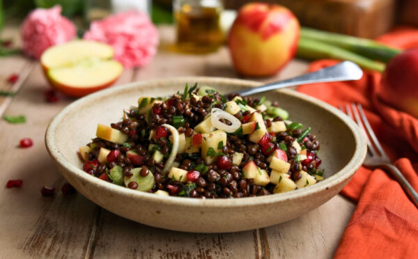 vegan apple summer salad with pomegranate, lentils, and mint