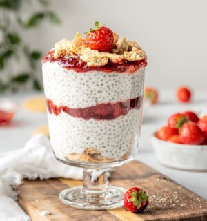 Strawberry Cheesecake Chia Pudding with coconut milk, cashews, vanilla, digestives, and strawberry compote