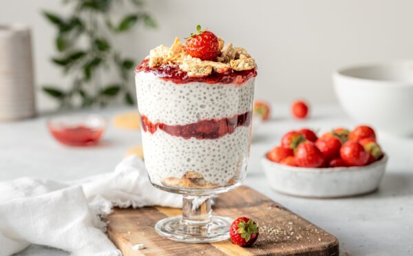 Strawberry Cheesecake Chia Pudding with coconut milk, cashews, vanilla, digestives, and strawberry compote